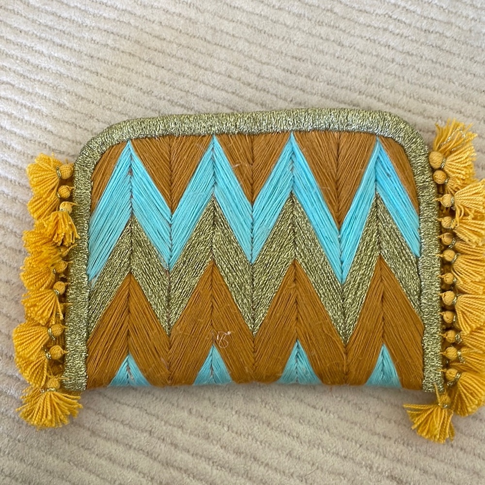 Vacation clutch with tassels